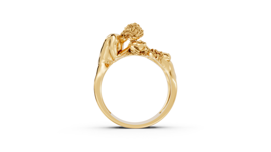 Gold ring with a detailed design on a white background