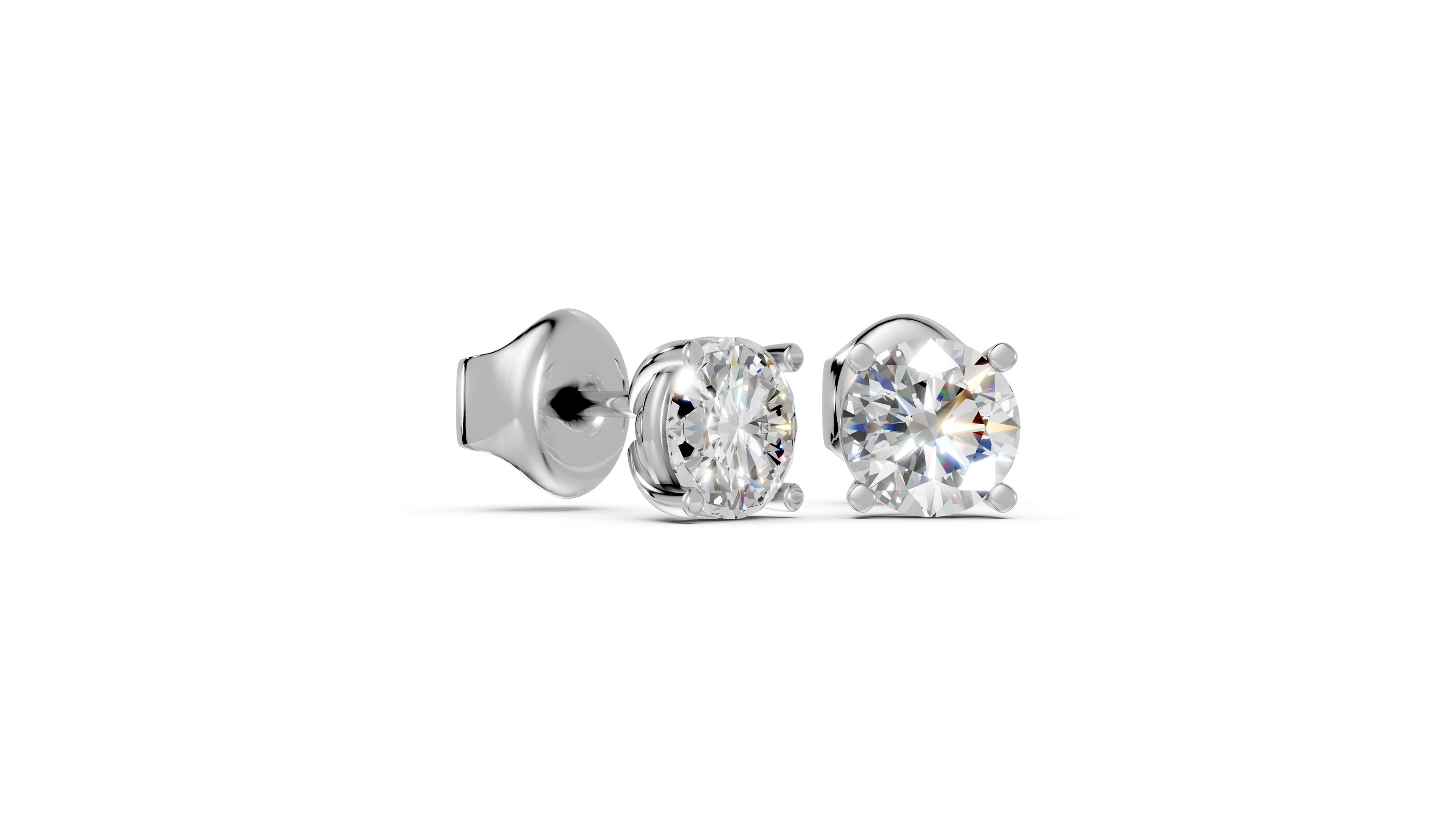 Round studs front and side in white gold