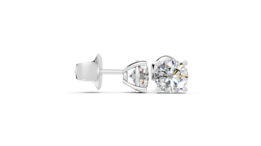 Round studs front and side in white gold