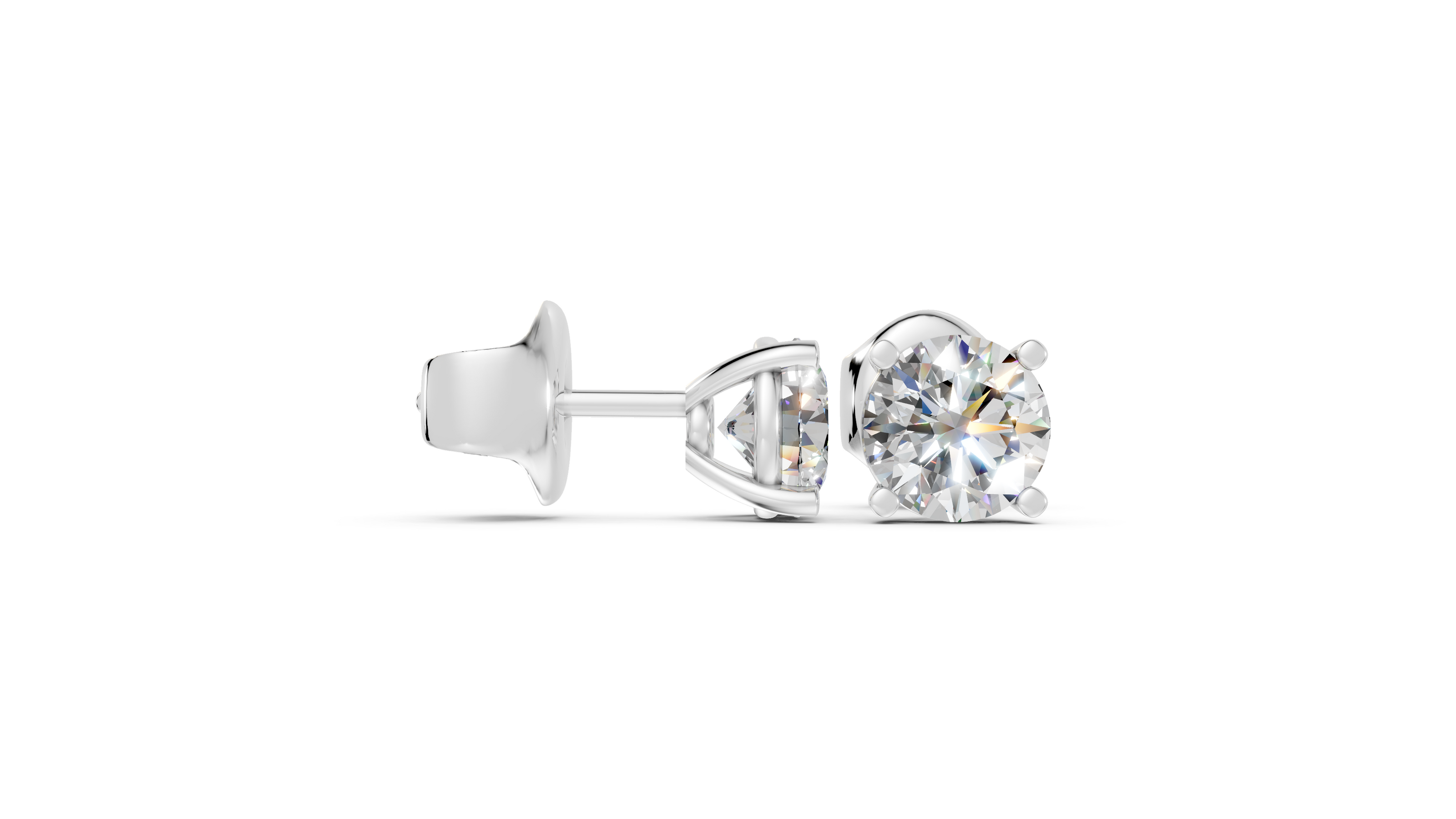 Round studs front and side in white gold