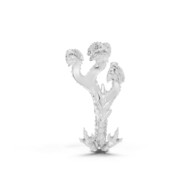 Silver earring with floral design on a white background