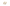 Gold earrings with clear gemstones on a white background