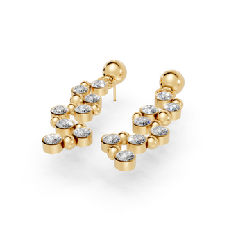 Gold earrings with clear gemstones on a white background