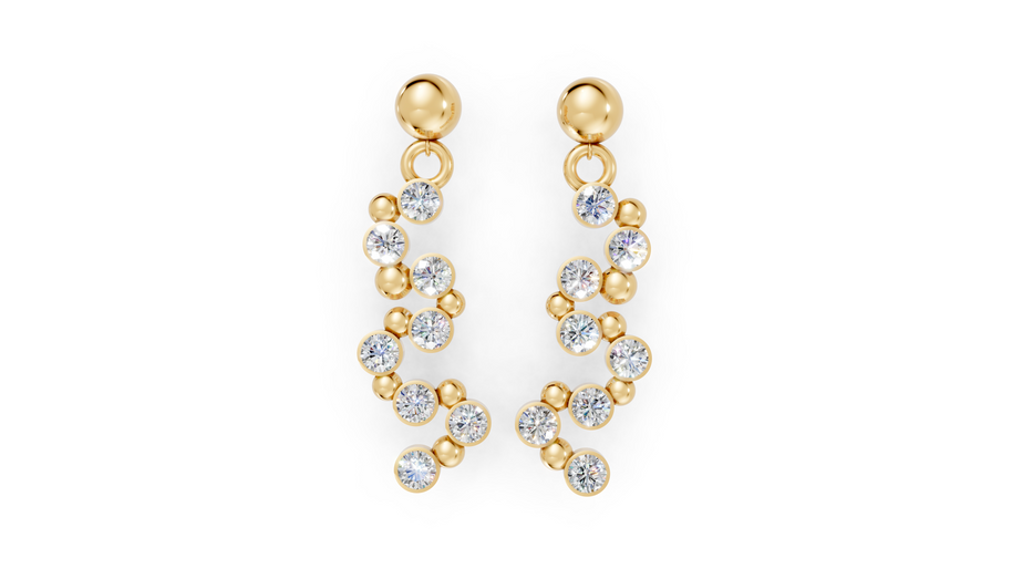 Gold earrings with clear stones on a white background