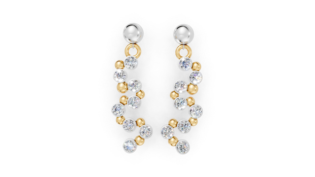 Pair of earrings with gold and silver beads on a white background