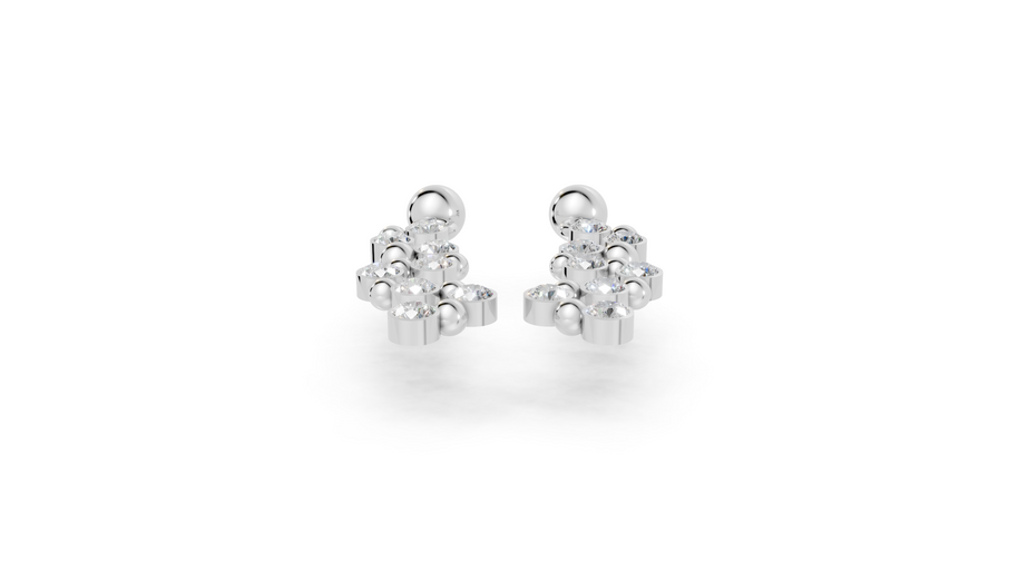 Pair of silver floral earrings on a white background