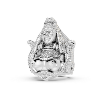 Silver ring with a detailed design on a white background