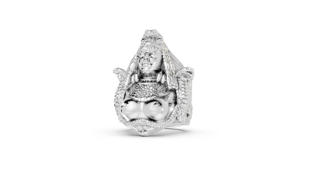 Silver ring with a detailed design on a white background