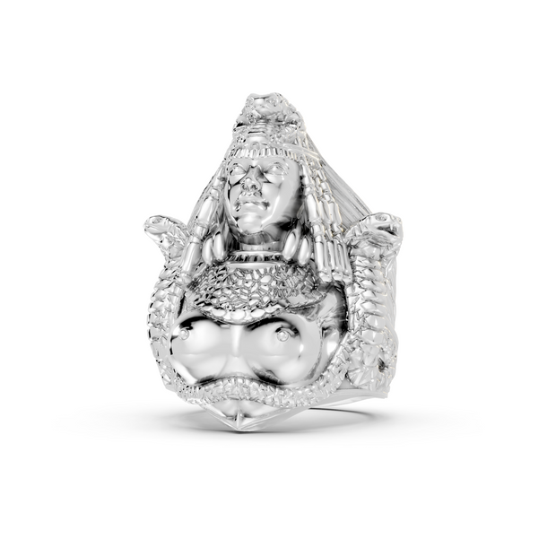 Silver ring with a detailed design on a white background