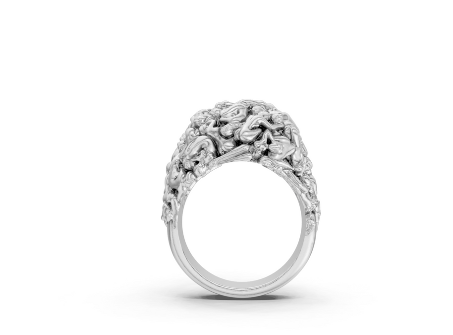 Silver ring with intricate design on a white background