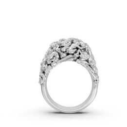Silver ring with intricate design on a white background