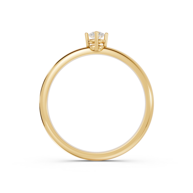 Gold ring with a diamond on a white background