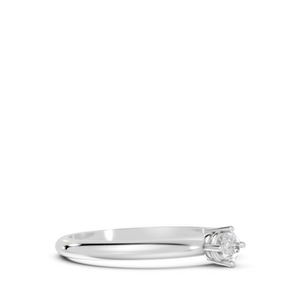 Silver ring with a diamond on a white background