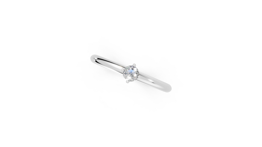 Silver ring with a small diamond on a white background