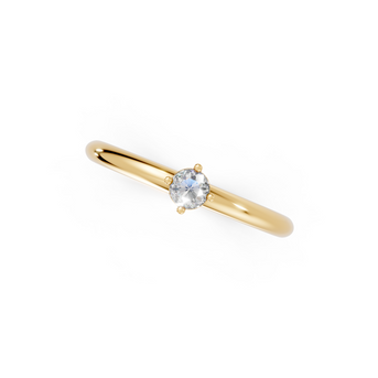 Gold ring with a diamond on a white background