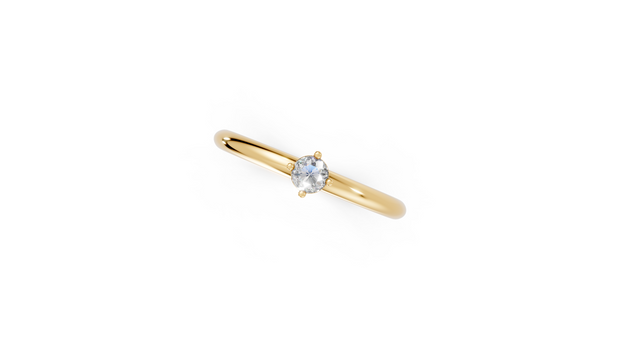 Gold ring with a diamond on a white background