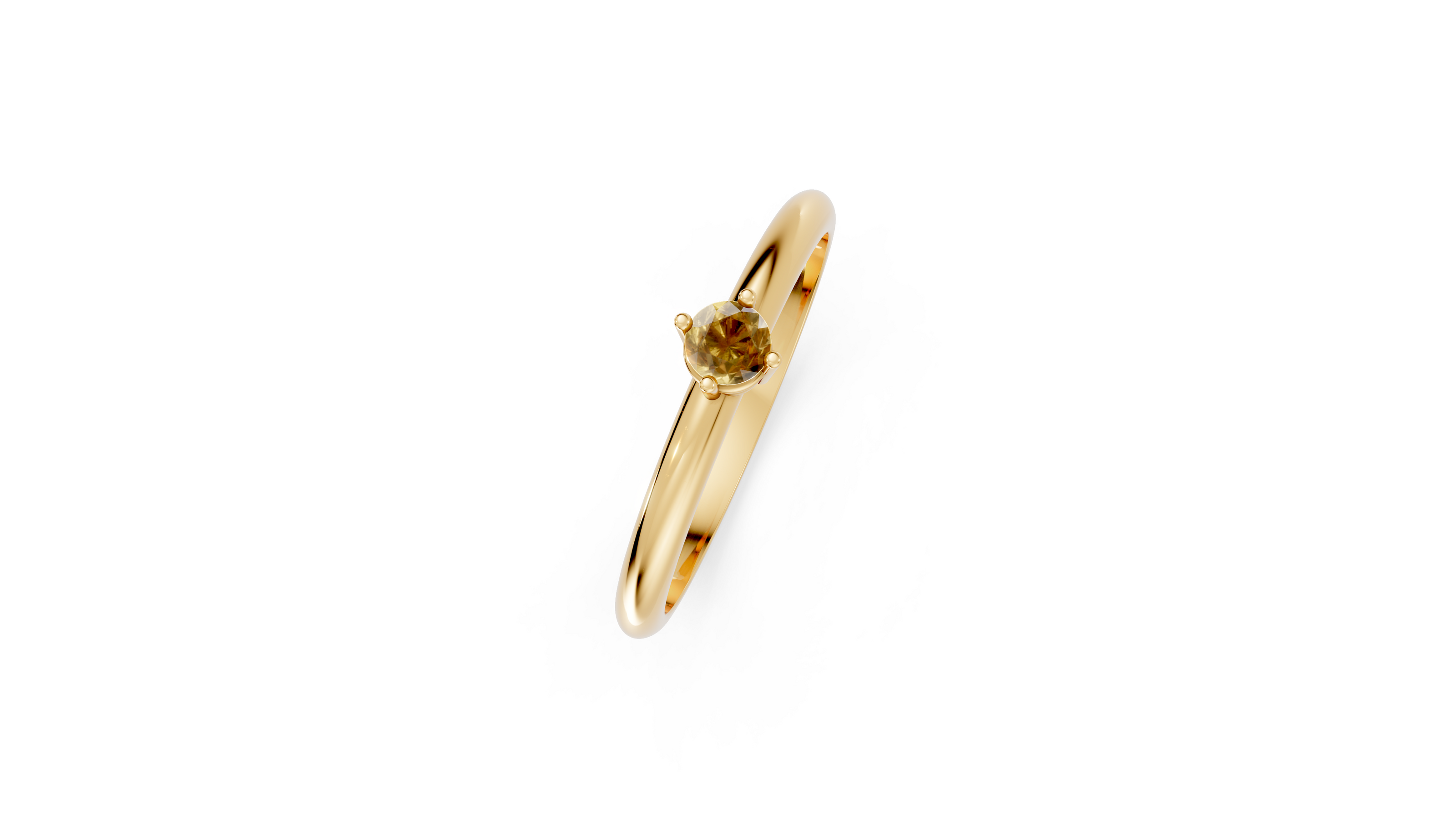 Gold ring with a small gemstone on a white background