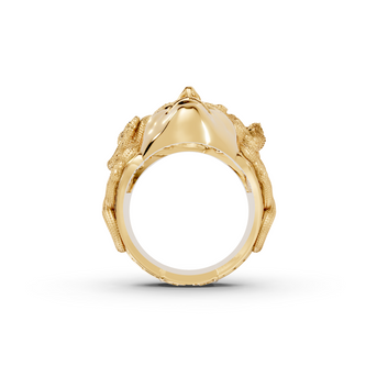 Gold ring with a detailed design on a white background