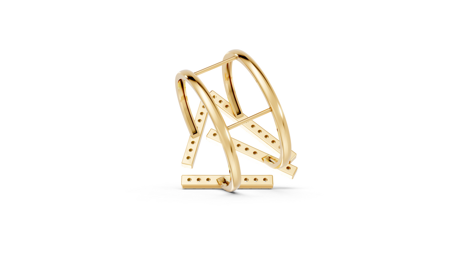 Gold ring with geometric design on a white background