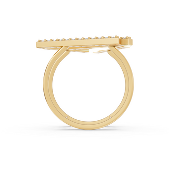 Gold ring with a textured band on a white background