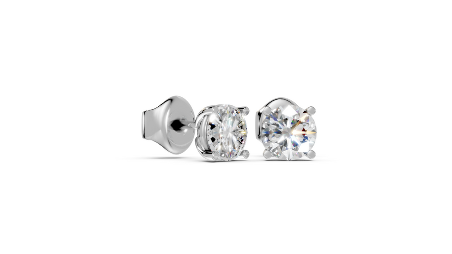 Round studs front and side in white gold