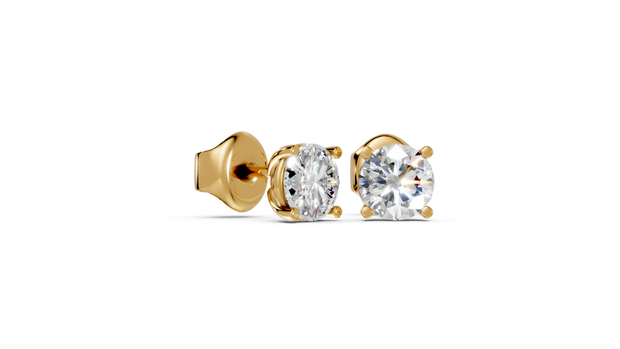 Round studs front and side in yellow gold
