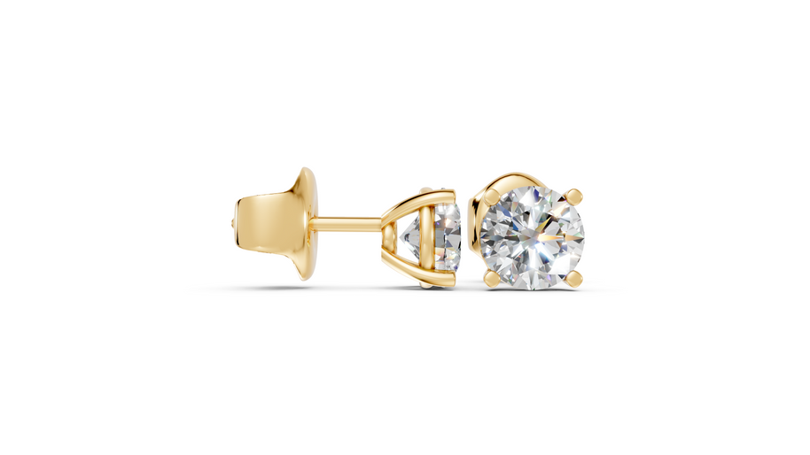 Round studs front and side in yellow gold