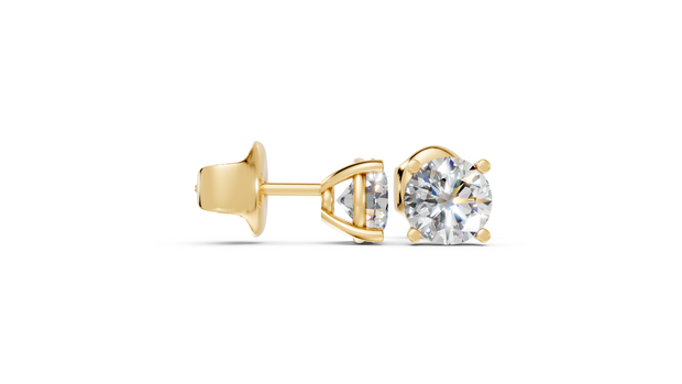 Round studs front and side in yellow gold