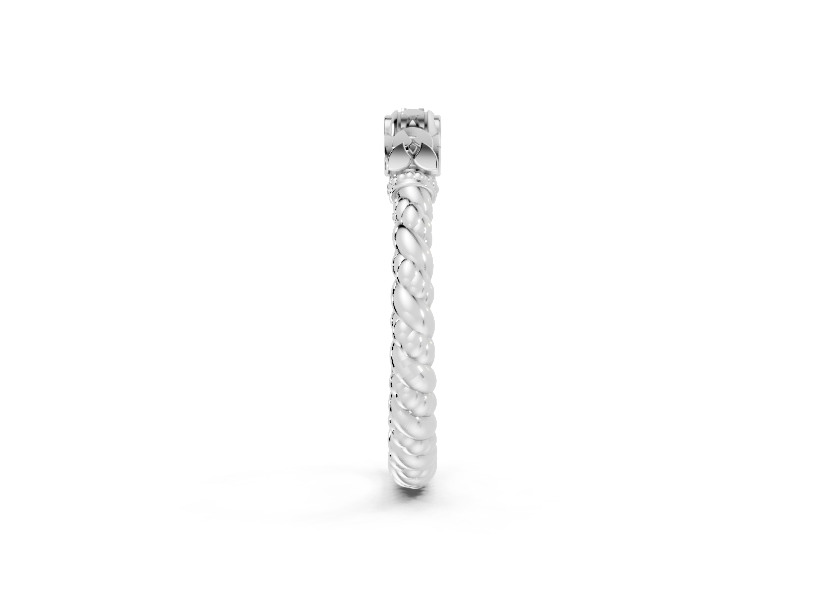 Silver ring with a textured design on a white background