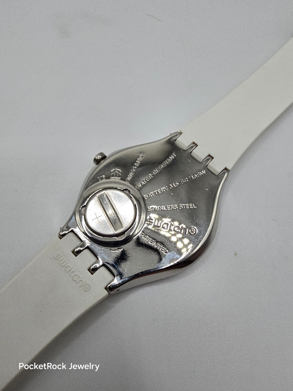 Swatch Skindoree White Silicone Watch (SYXS108) Skin Irony