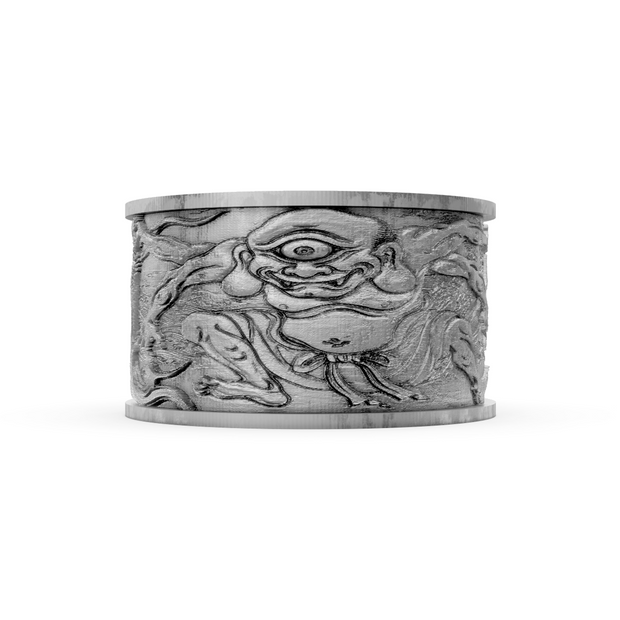 Silver cuff bracelet with intricate design on a white background