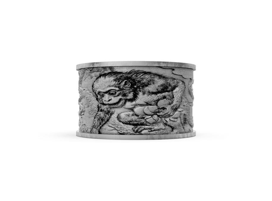 Decorative stone object with a monkey design on a white background