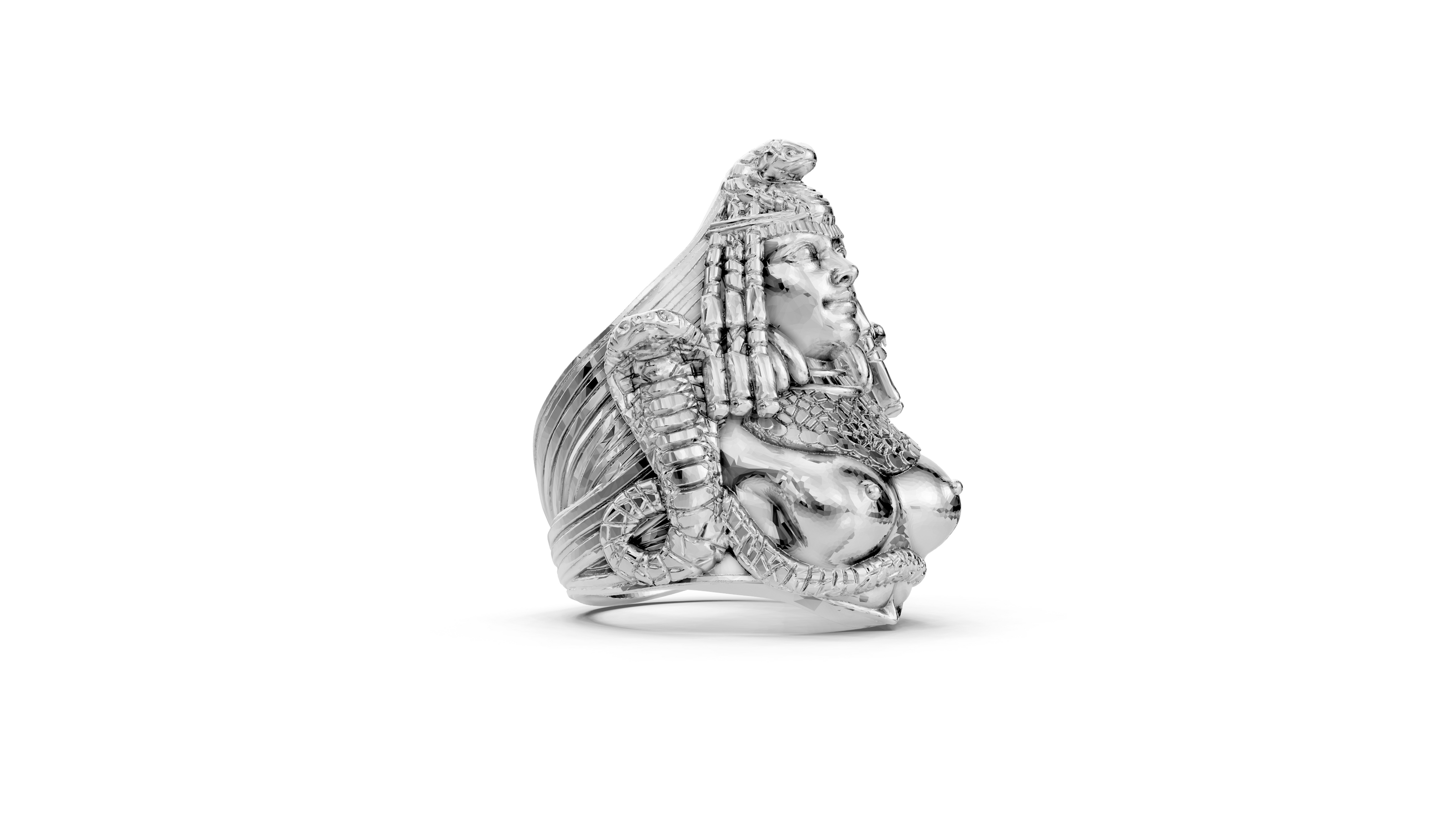 Silver ring with intricate design on a white background