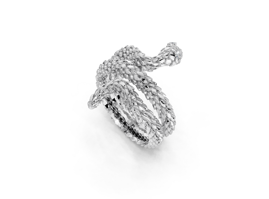 Silver ring with textured design on a white background