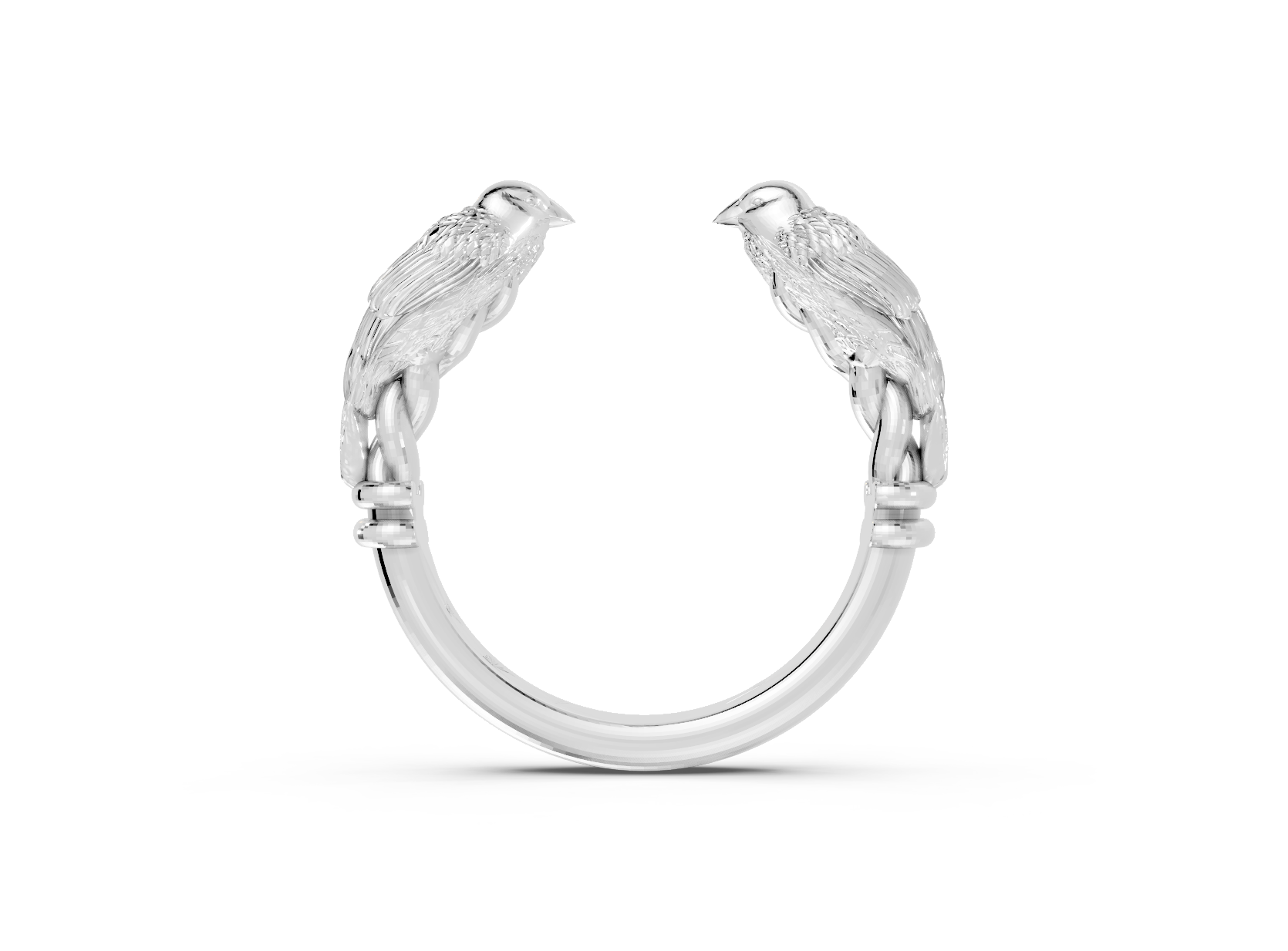 Silver ring with parrot designs on a white background