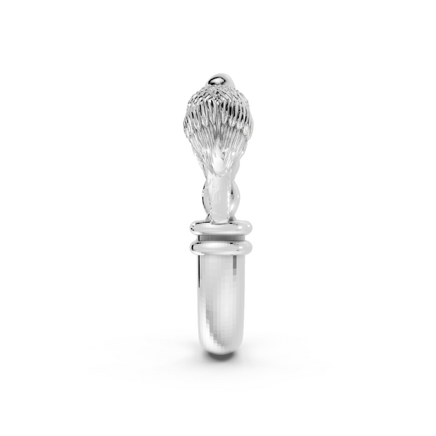 Silver ring with a detailed design on a white background