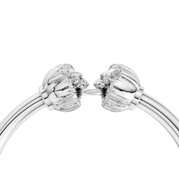 Silver bracelet with floral clasp on a white background