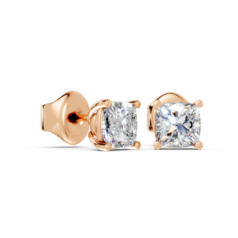 cushion studs front and angled in yellow gold