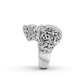 Silver ring with intricate design on a white background