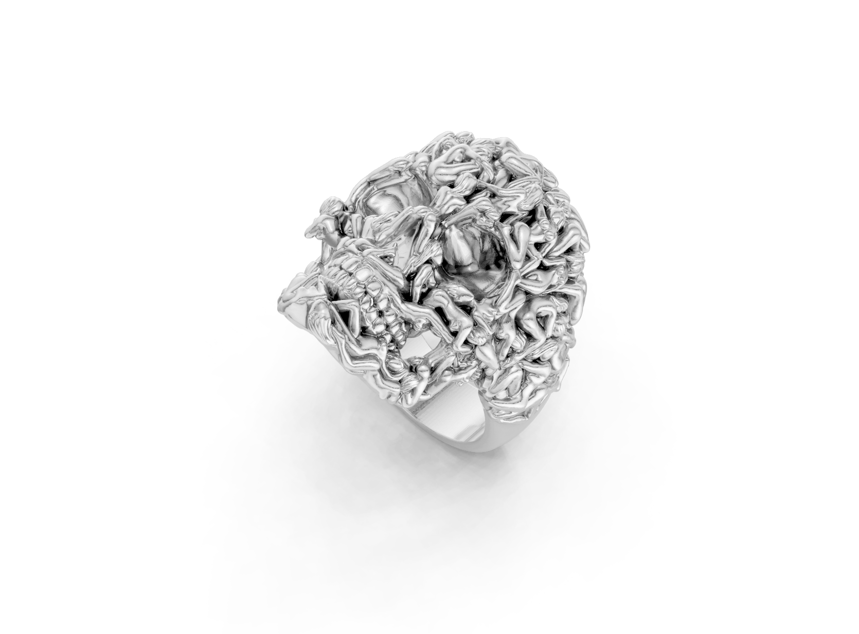 Silver ring with intricate design on a white background