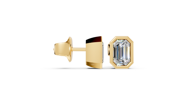 emerald bezel gold studs side