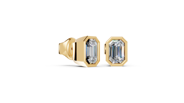 emerald bezel gold studs side angled