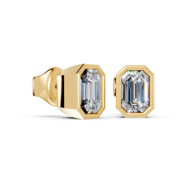 emerald bezel gold studs side angled