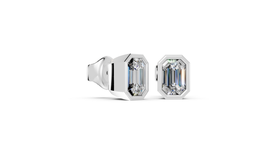 emerald bezel white studs side angled