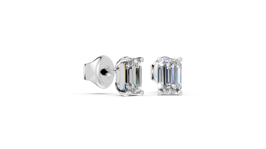 emerald studs front and angled in white gold