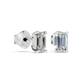 emerald studs front and angled in white gold
