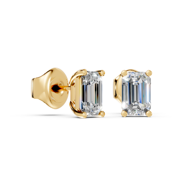 emerald studs front and angled in yellow gold