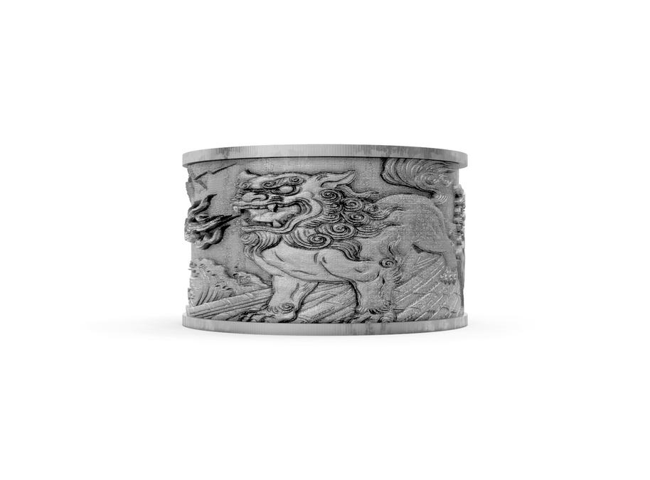 Silver bracelet with intricate designs on a white background