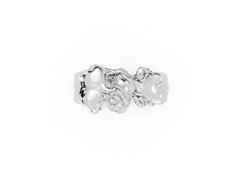 Silver ring with floral design on a white background