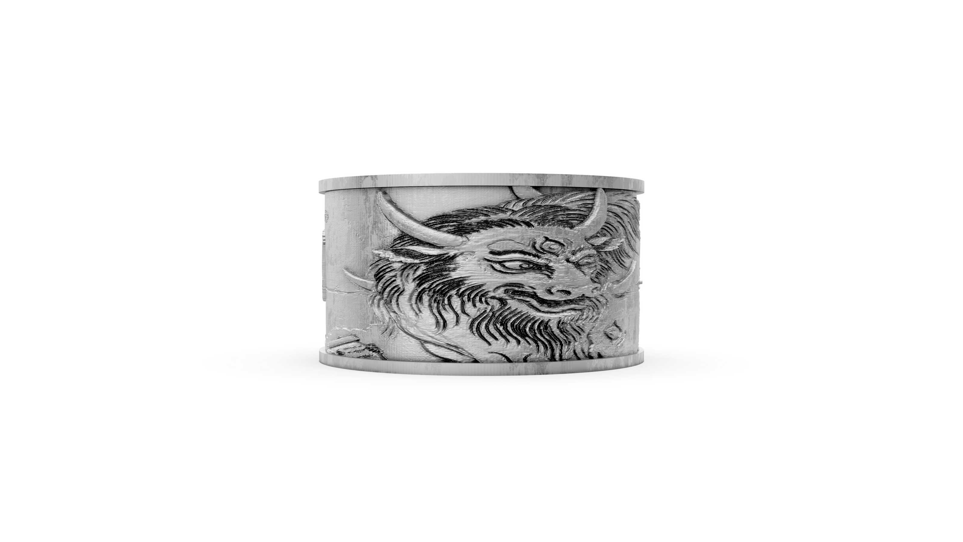 Silver cuff bracelet with dragon design on a white background